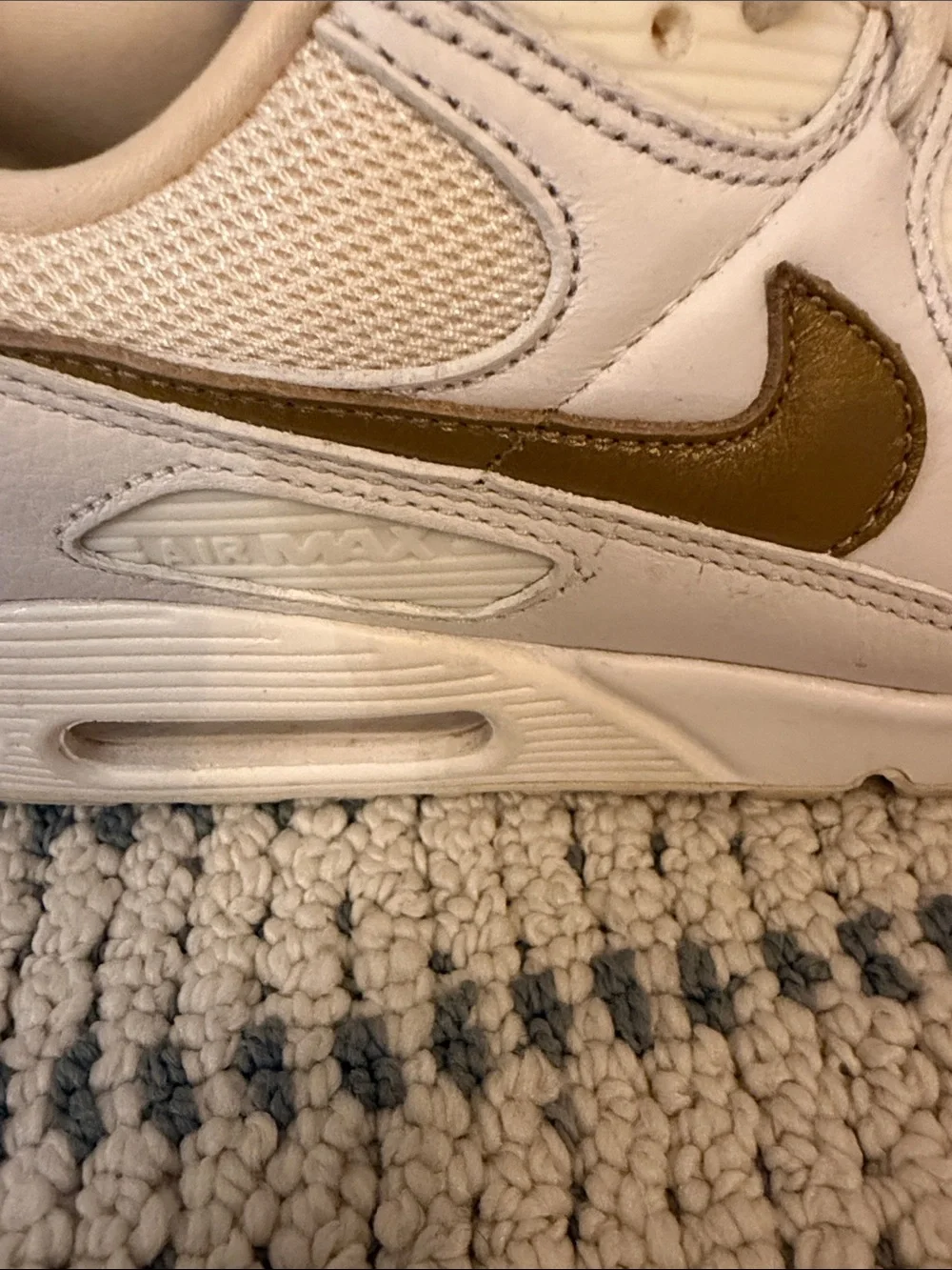 Nike Women’s Cream Sneakers with Gold Swoosh
